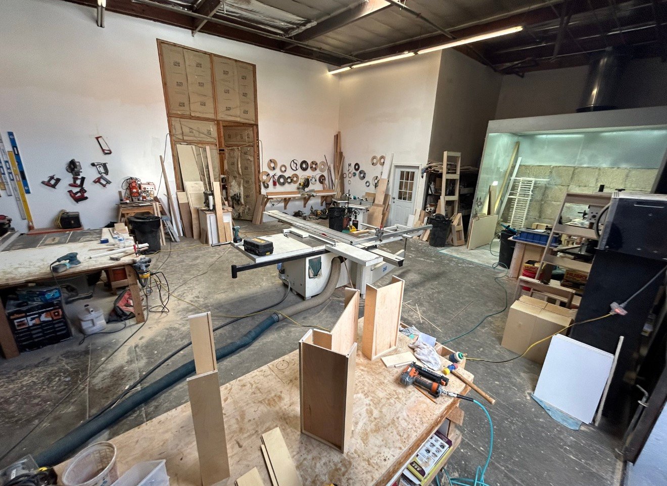Cabinetmaking workshop with a table saw and fabrication area